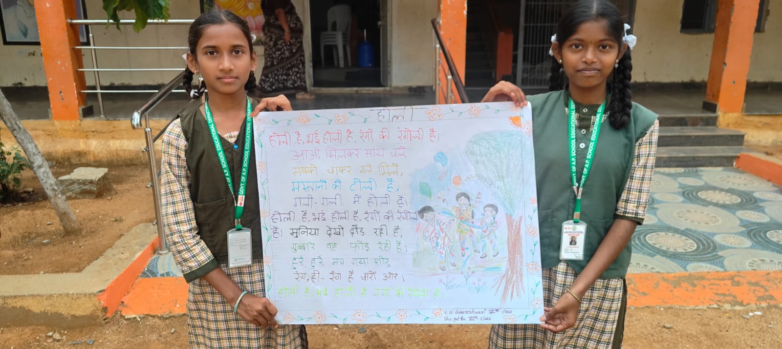 Students presenting an educational poster during a school activity